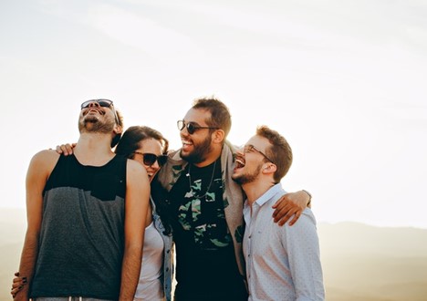 a group of friends laughing together