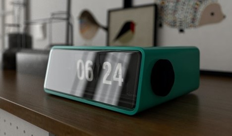 An alarm clock showing 6:24 AM