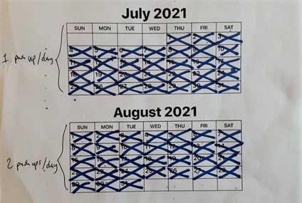 A calendar of July and August 2021, filled with X's I used to track my push-up habit