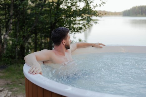 a man in a hot tub