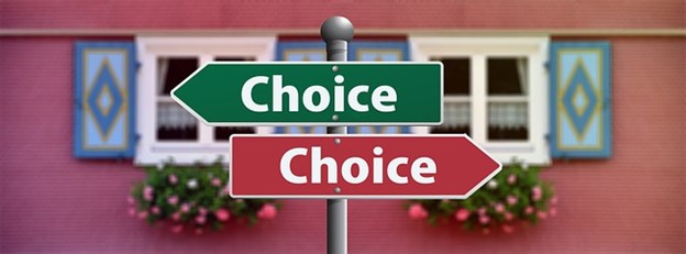 a road sign with "choice" pointing to the right and to the left