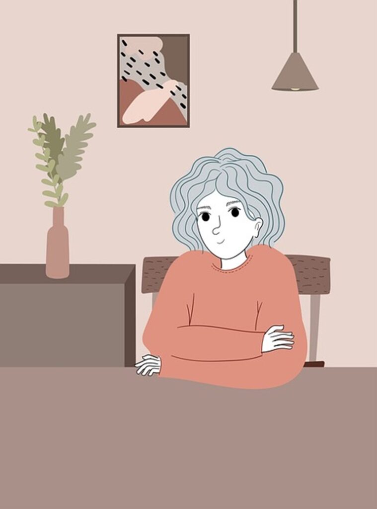 a woman with gray hair in a sweater looking content