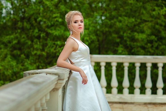 a bride looking proud, entitled, and stuck up