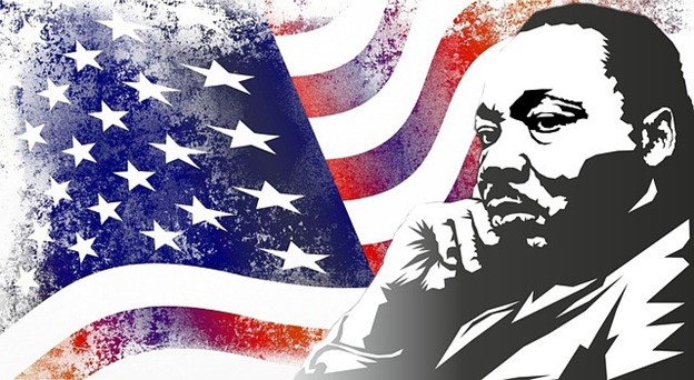 an artist's image of Dr. Martin Luther King, Jr. in front of an American flag