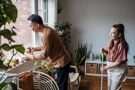 a couple where each person is doing unique chores