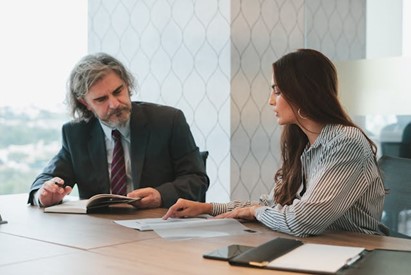 Two business people negotiating