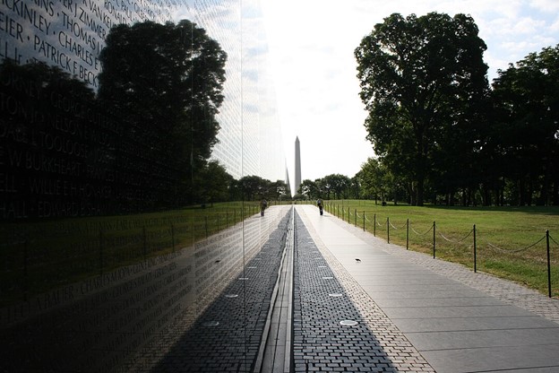 The Vietnam War Memorial with the Washington Monument in the background