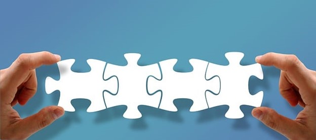 Four puzzle pieces fitted together