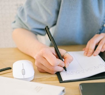 writing a plan at a desk