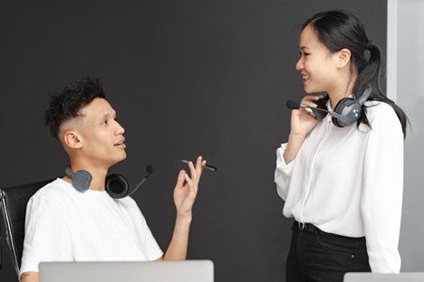 two colleagues discussing something