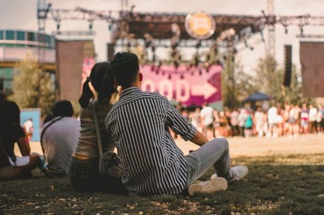 a couple at an outdoor concert
